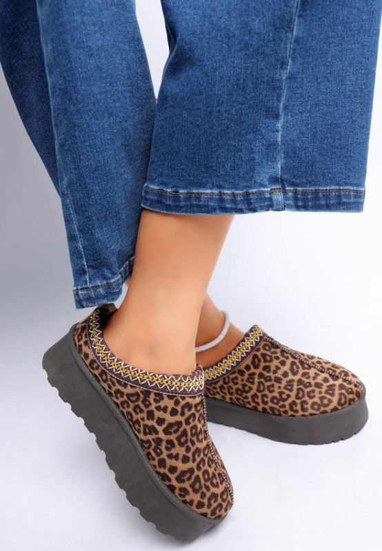 Leopard print platform classic slip-on with stitched collar and dark outsole