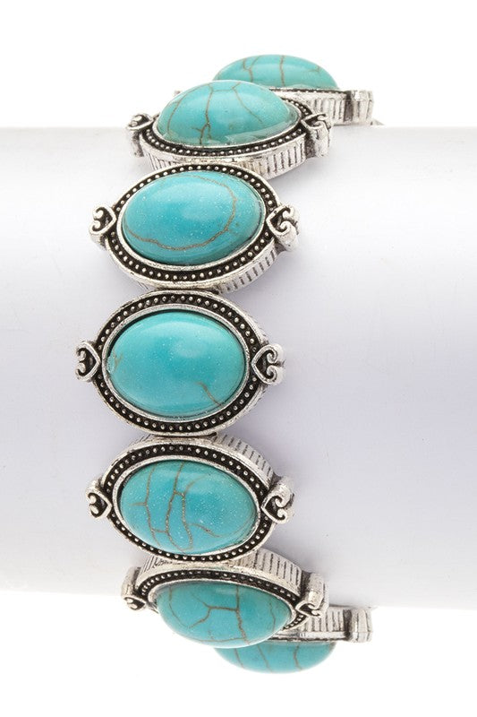 Oval stone western stretch bracelet, turquoise cabochons with silver-toned filigree cuff