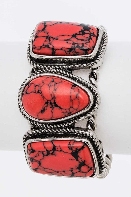 Silver open western bangle with red oval stone insets, black veining, O/S