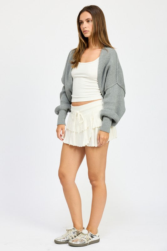 Dark gray oversized shrug cardigan, wide sleeves and ribbed trim at cuffs