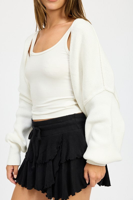 Off-white knit shrug cardigan, draped shoulder and ribbed sleeve cuffs