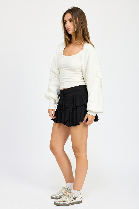 Off-white oversized shrug cardigan, open front and loose sleeves with ribbed cuffs
