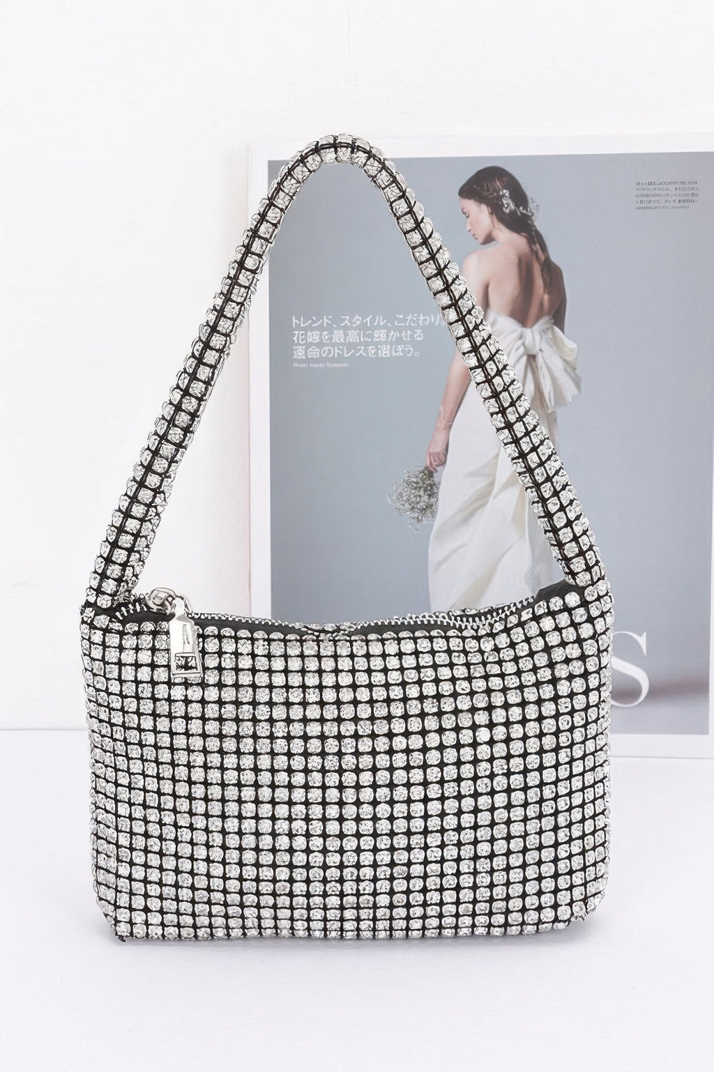 Oversized stone small hobo bag in clear/silver rhinestones, zip top, long handles
