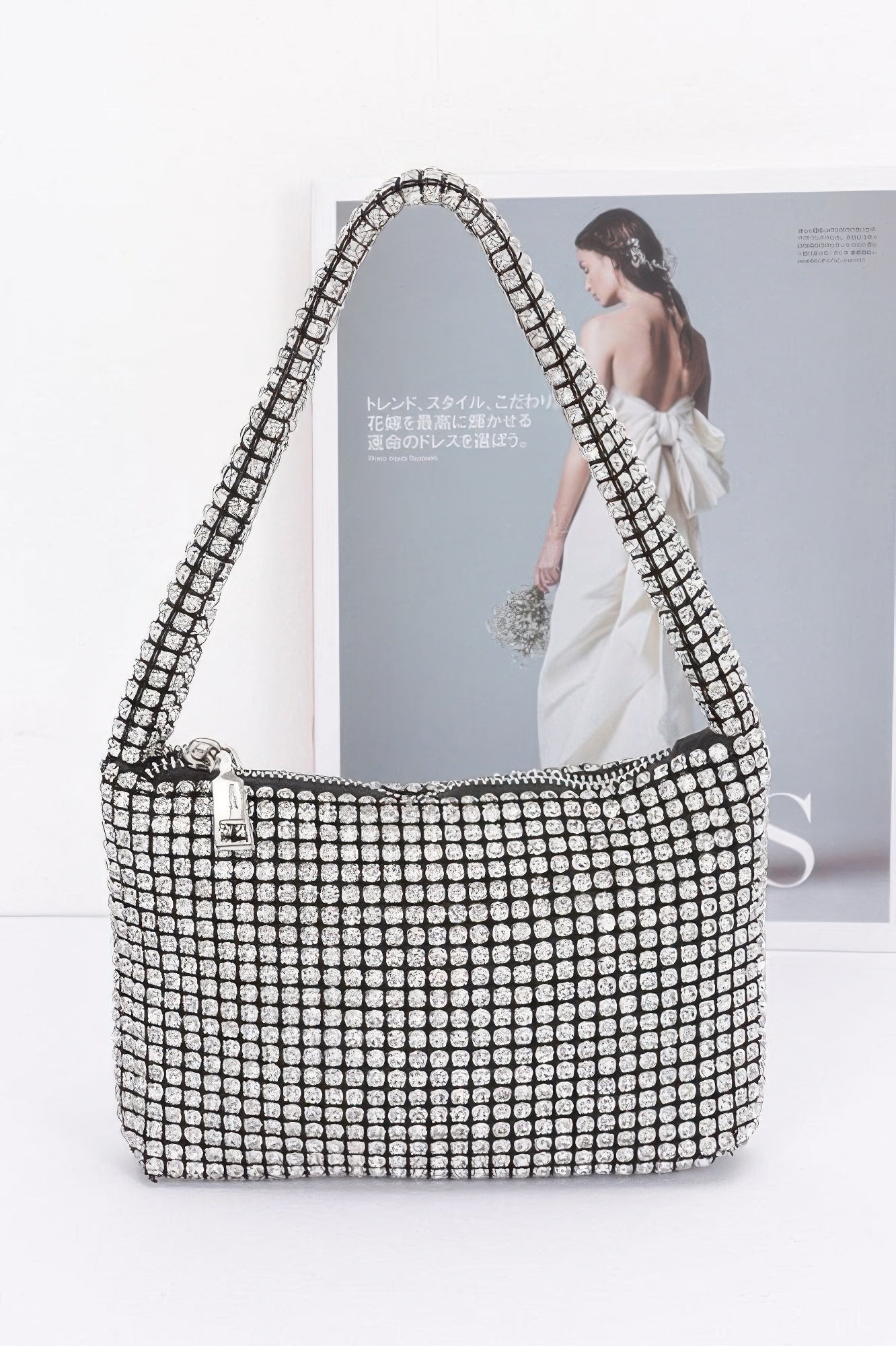 Oversized stone small hobo bag in clear/silver rhinestones, zip top, long handles