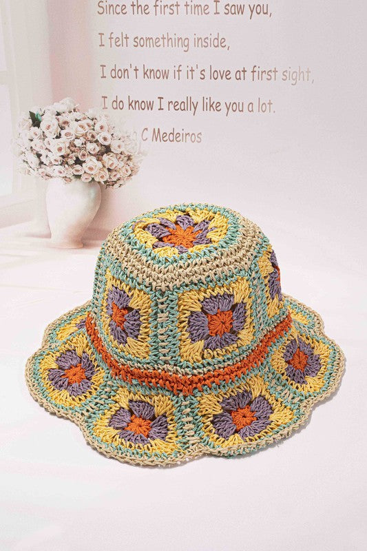 Multicolor granny-square crochet bucket hat with flower motifs, one size