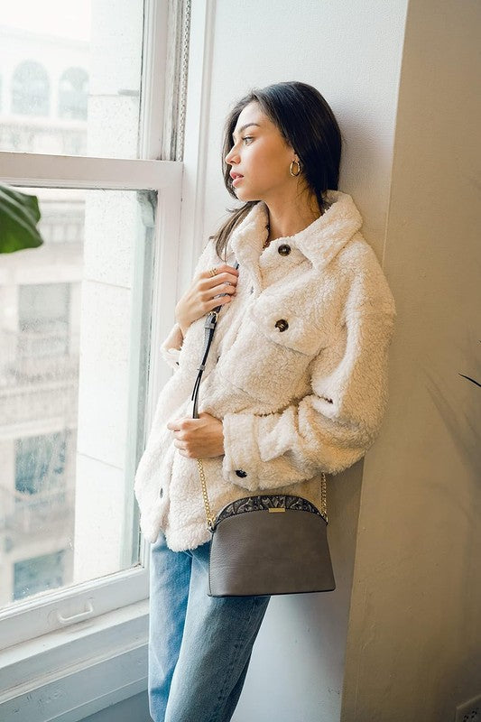 Paisley Accent Small Dome Crossbody Bag worn by model with chain shoulder strap