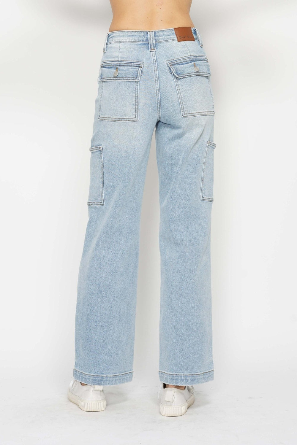 Light wash high-waist straight cargo jeans with back pockets and belt loops