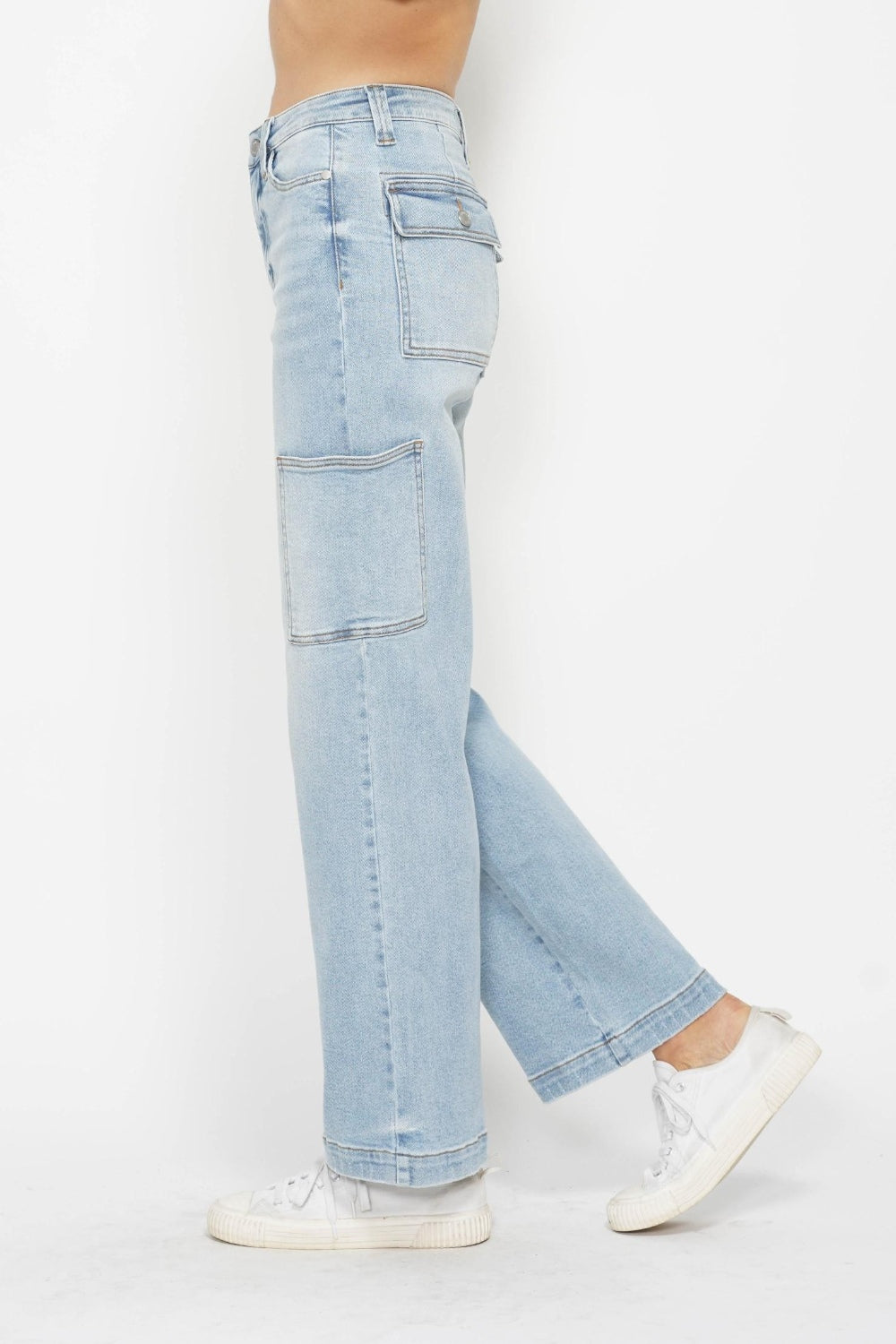 Light wash straight cargo jeans, front-side view with cargo pocket details