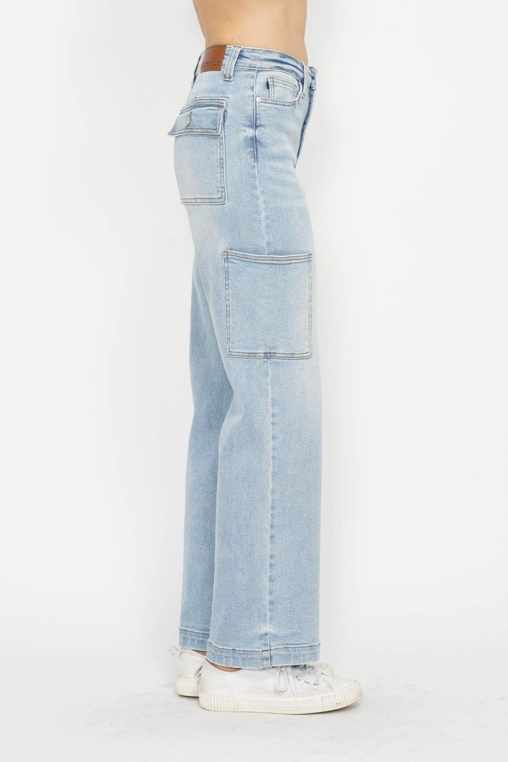 Light wash high-waist straight cargo jeans, side view showing wide leg and pocket