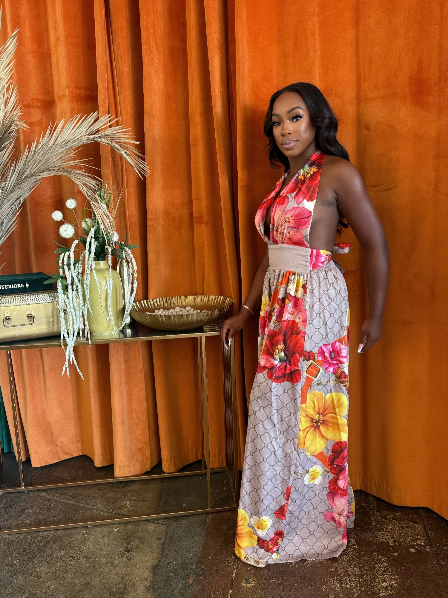 Paradise Bloom jumpsuit: halter neckline, floral wrap bodice, wide legs