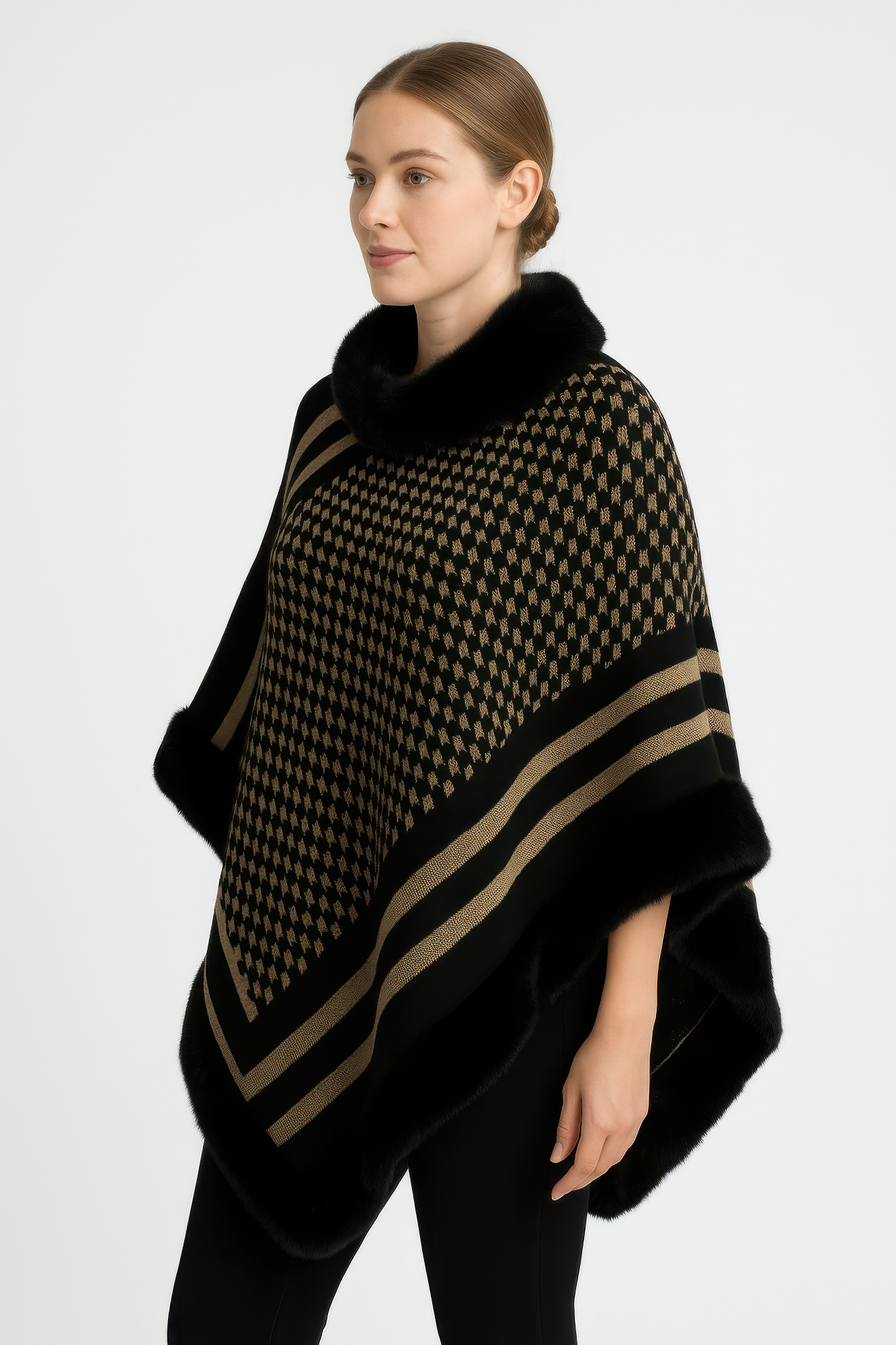Side view patterned knit poncho, faux fur collar and sleeve cuffs, black/gold