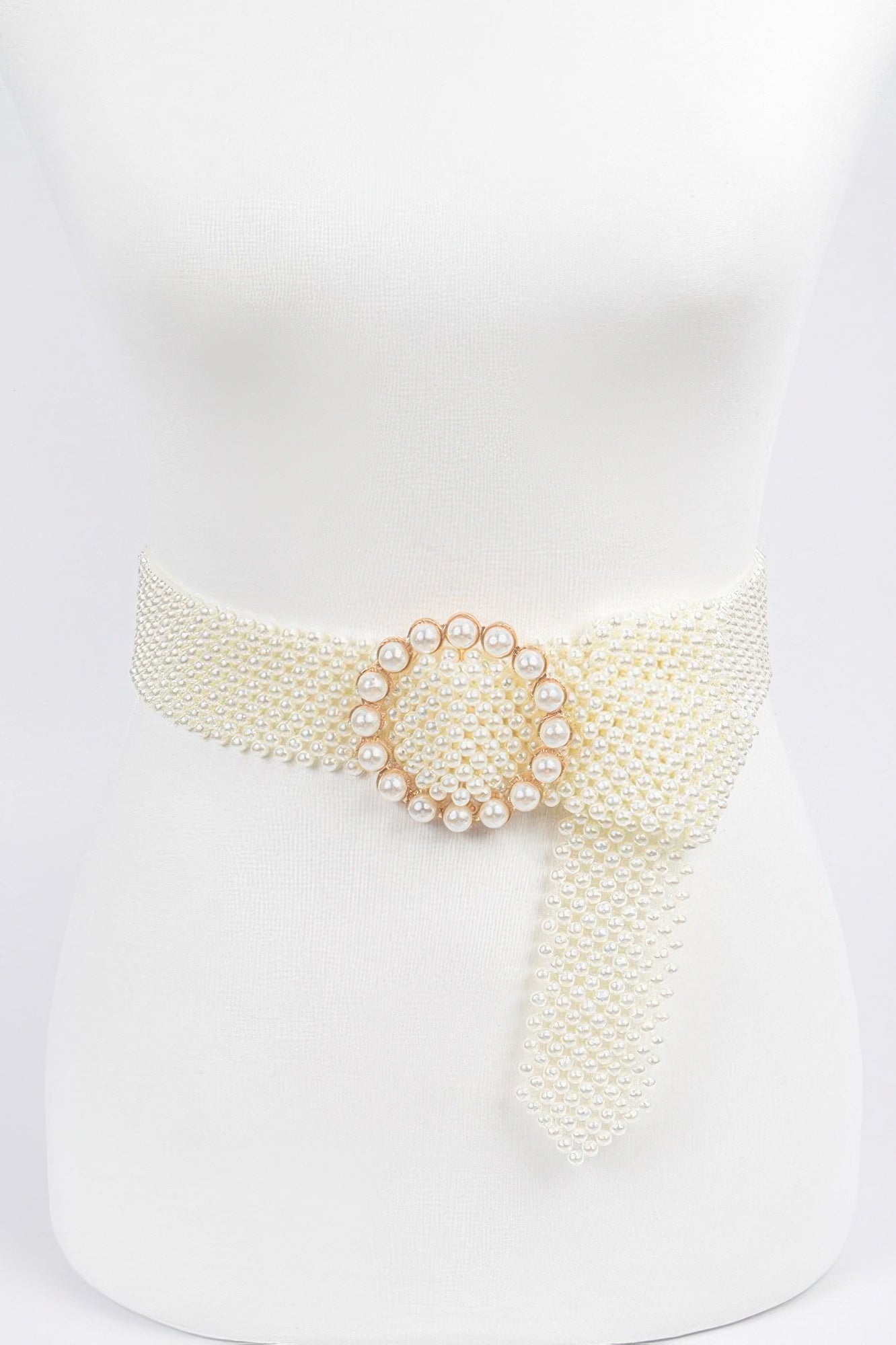 Ivory pearl beaded belt with circular pearl buckle at the front