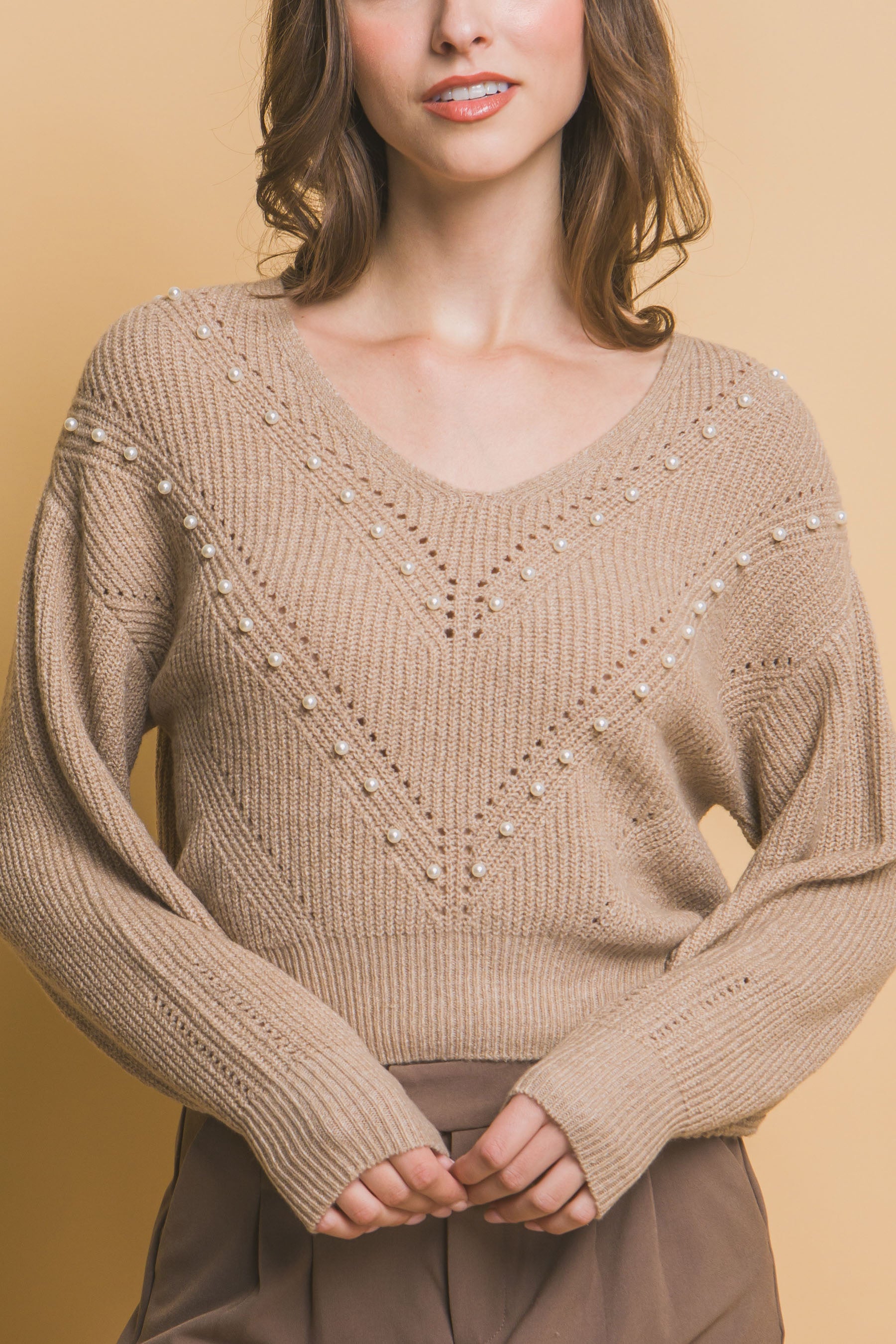 Khaki pearl beaded V-neck knit sweater with long sleeves and textured knit