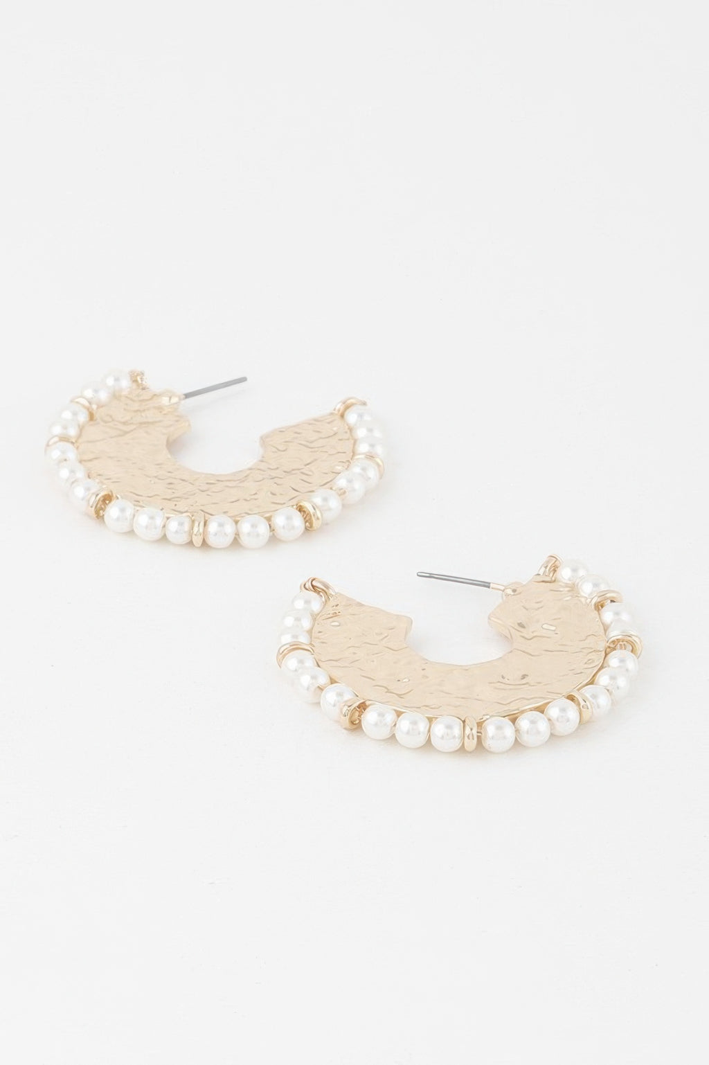 Pair of gold-toned hammered hoop earrings with pearl bead rows and hooks