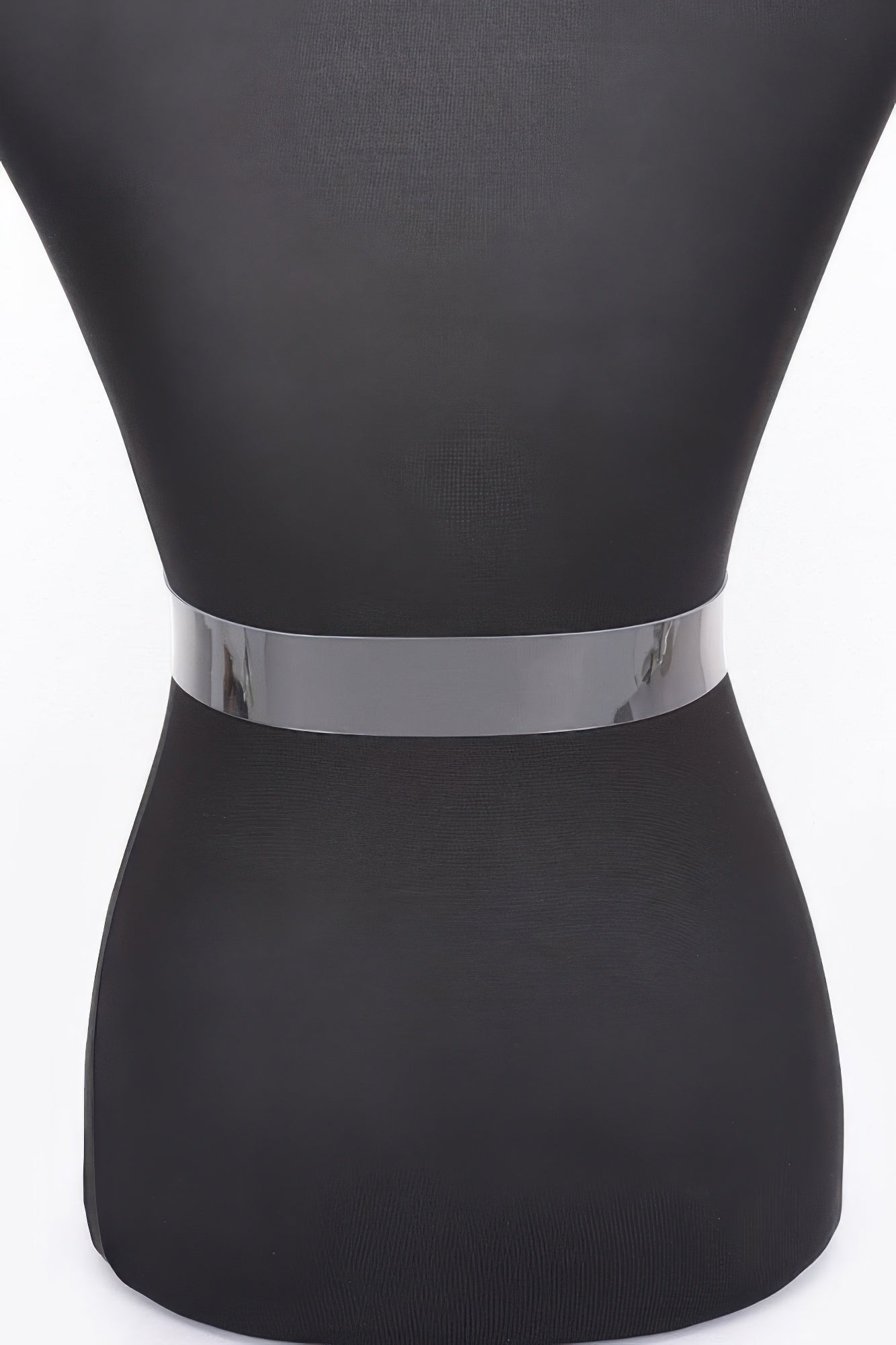Clear belt with wide silver metal buckle band on black waist