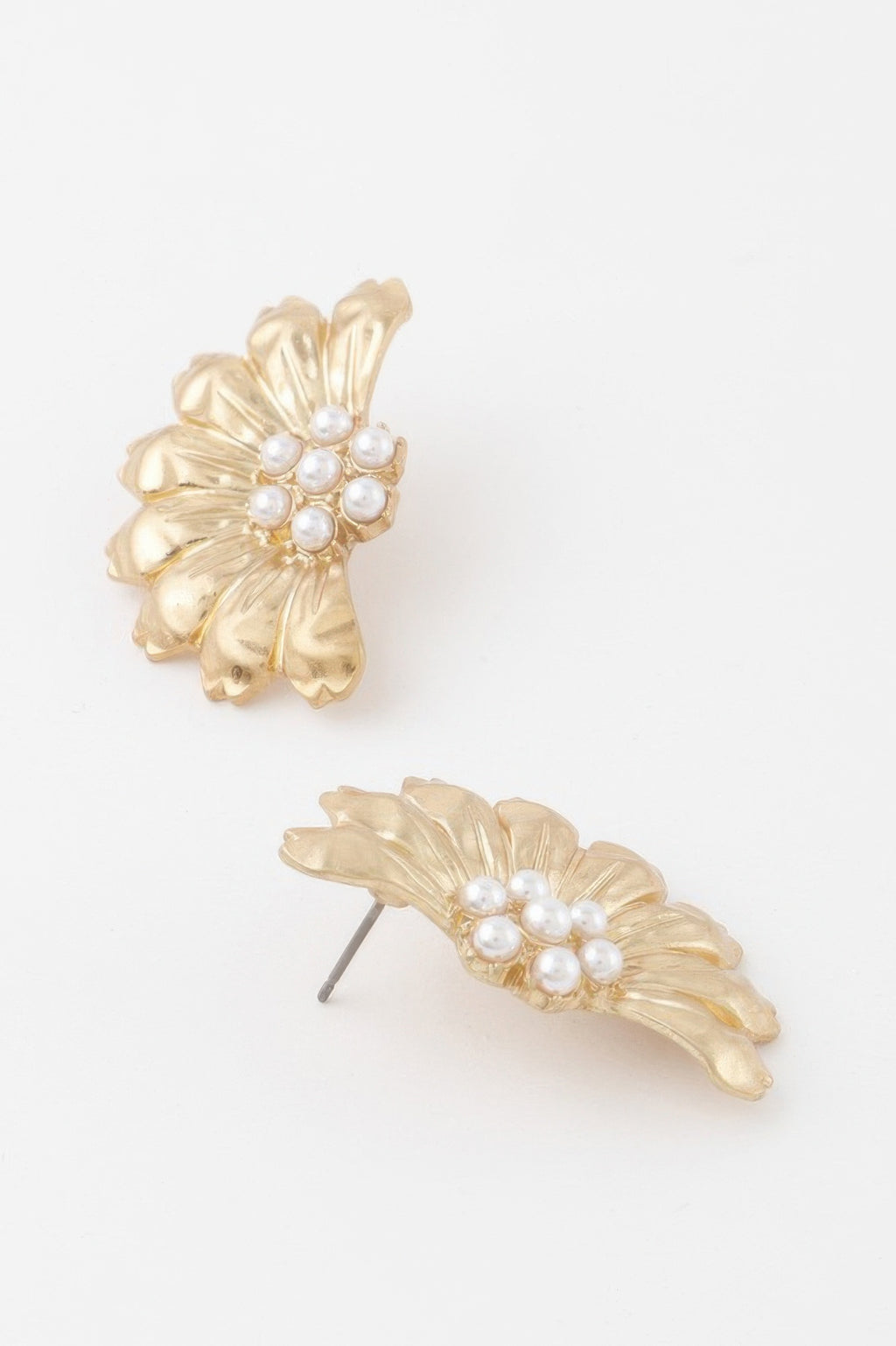 Gold-cream pearl half-flower stud earrings with leaf-like petals