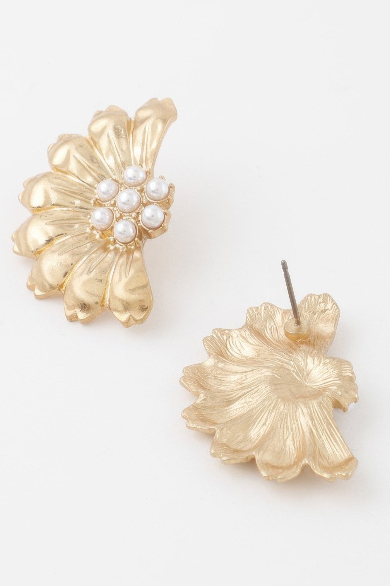 Gold-cream flower stud earrings, textured petals; one pearl-centered front shown