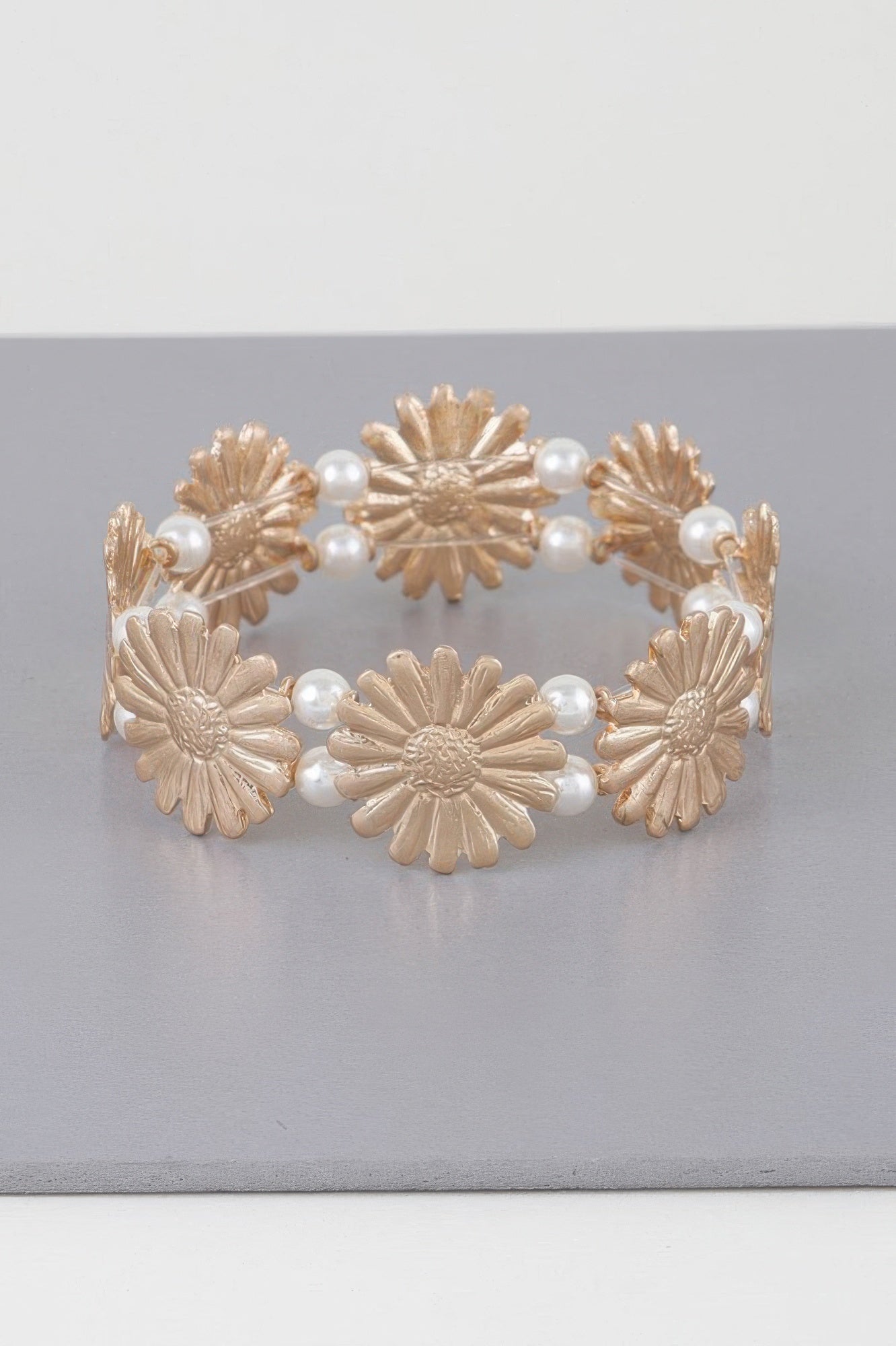 Gold-cream pearled sunflower bracelet, circular with scalloped flower charms and pearl links