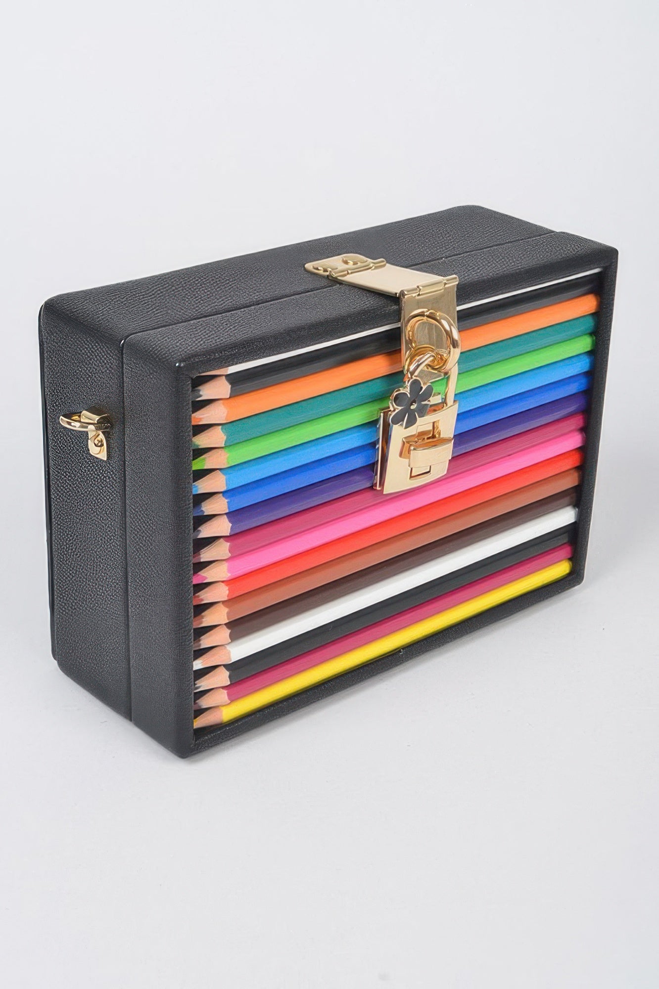 Black pencil case clutch with lock and key clasp, stacked colored pencils