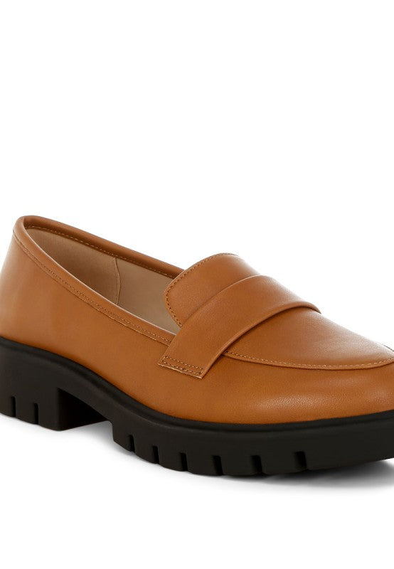 Peridot chunky loafers in tan faux leather, penny-style strap and thick black tread sole