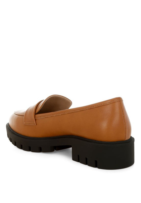 Peridot chunky loafers in tan faux leather, rear view with black platform tread sole