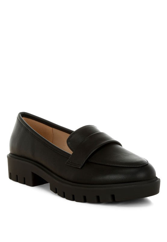 Black faux-leather chunky loafer with slip-on strap and molded tread sole