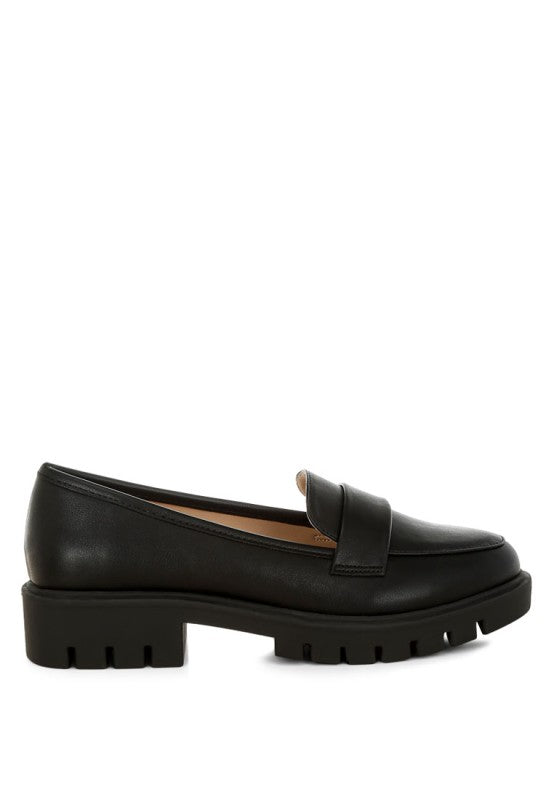 Black faux-leather chunky loafer side view, slip-on strap, thick tread