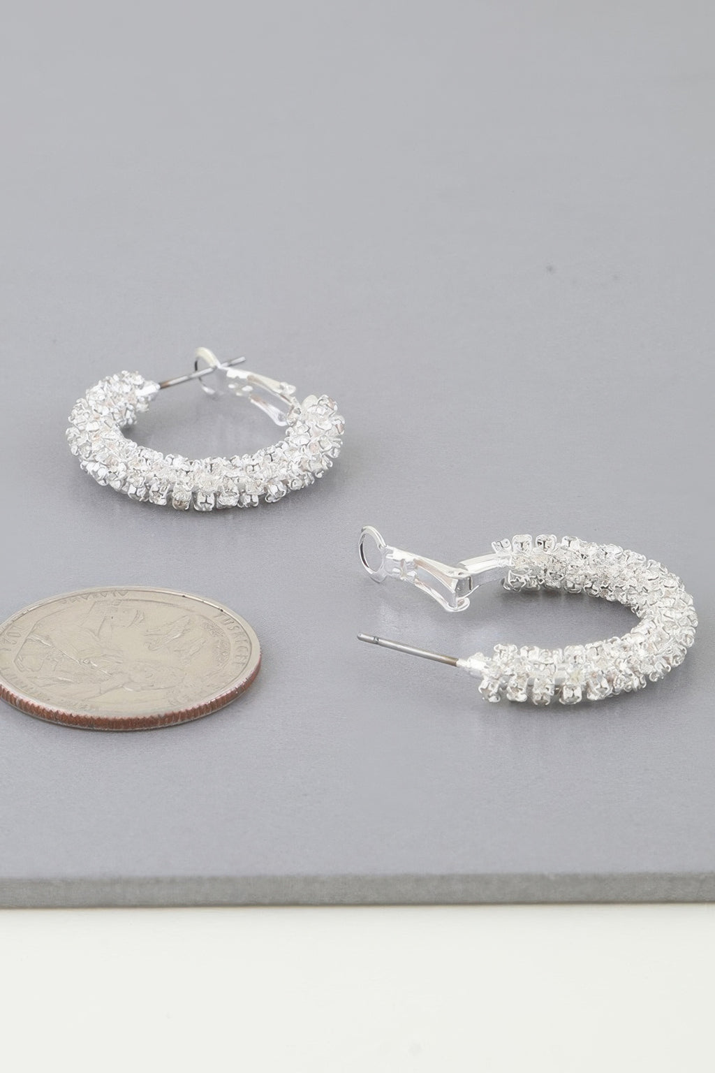 Petite bejeweled hoop earrings in silver with crystal pavé hoop detail