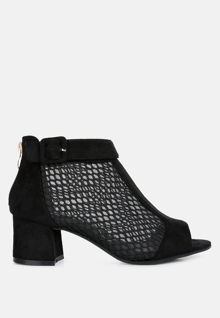 Black mesh ankle boot with block heel on a white background
