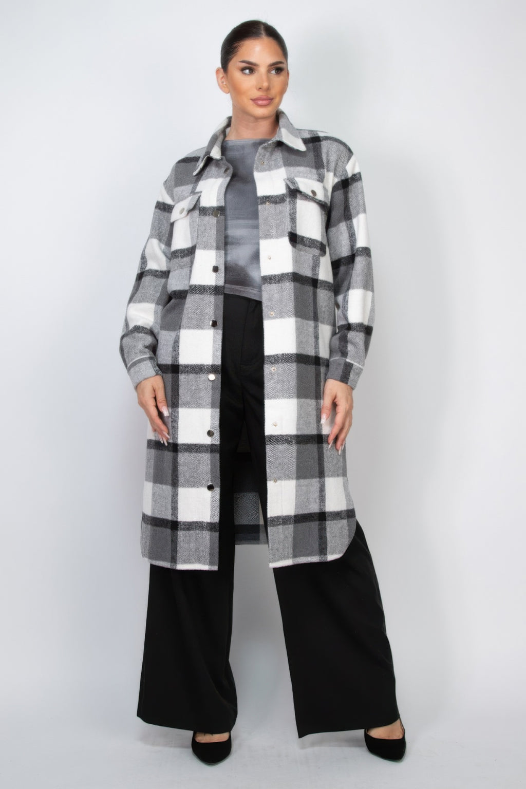 Plaid buttoned shacket coat in black-and-white check, collared front with snap buttons