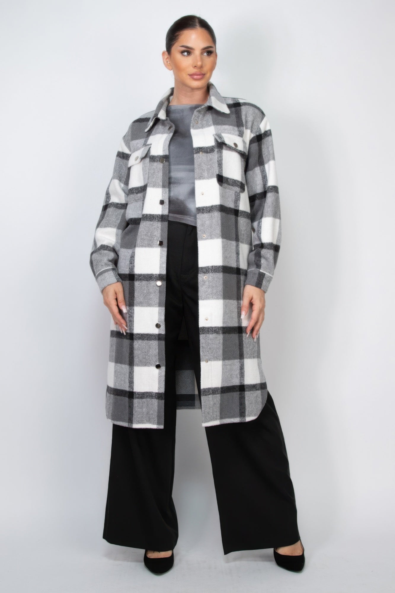 Plaid buttoned shacket coat in black-and-white check, collared front with snap buttons