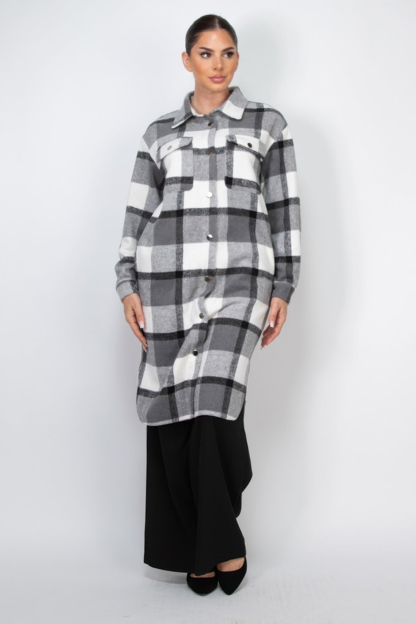 Black-and-white plaid shacket coat with button front and flap chest pockets