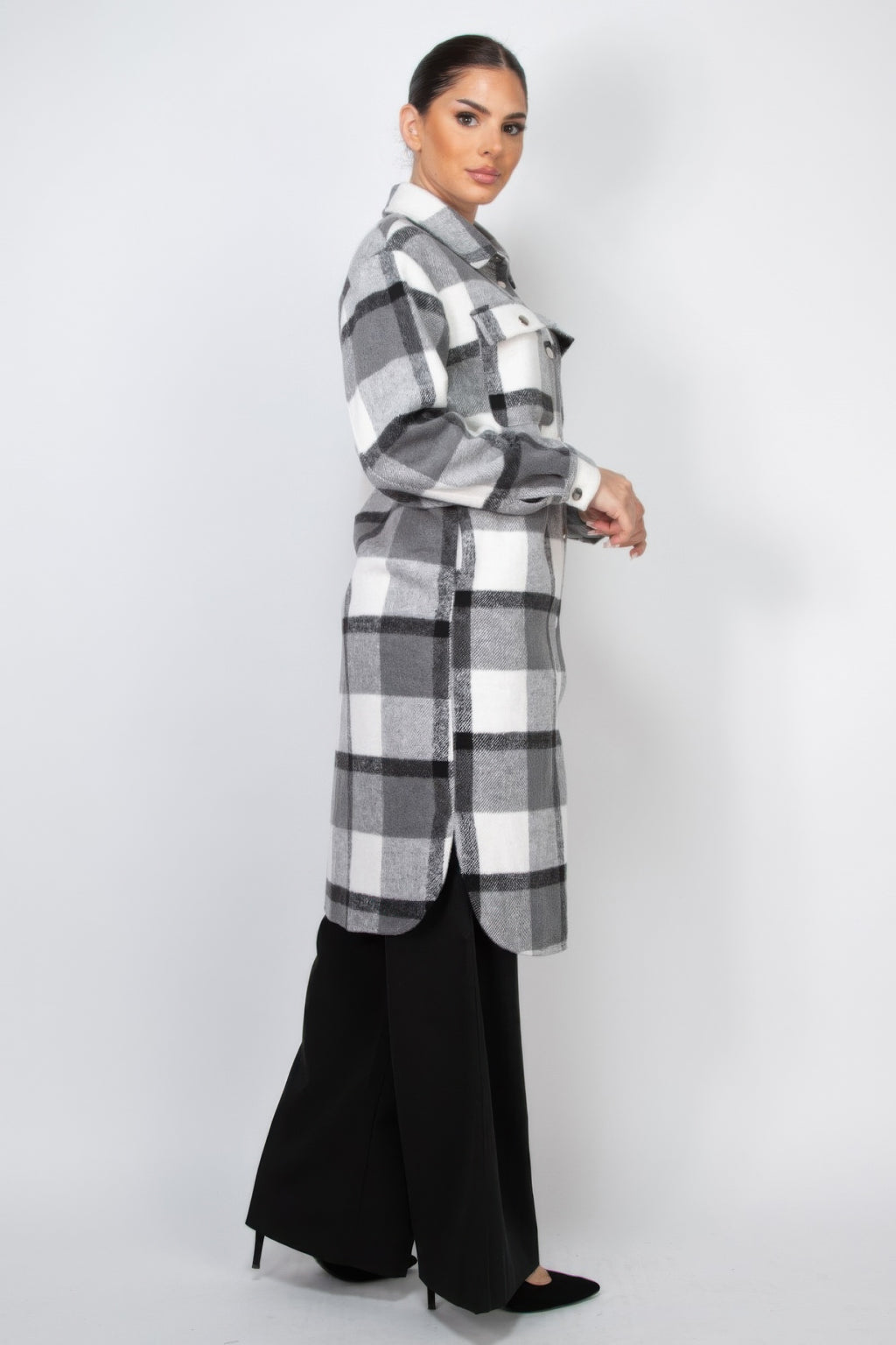 Plaid shacket coat in black-and-white check, side view with button placket
