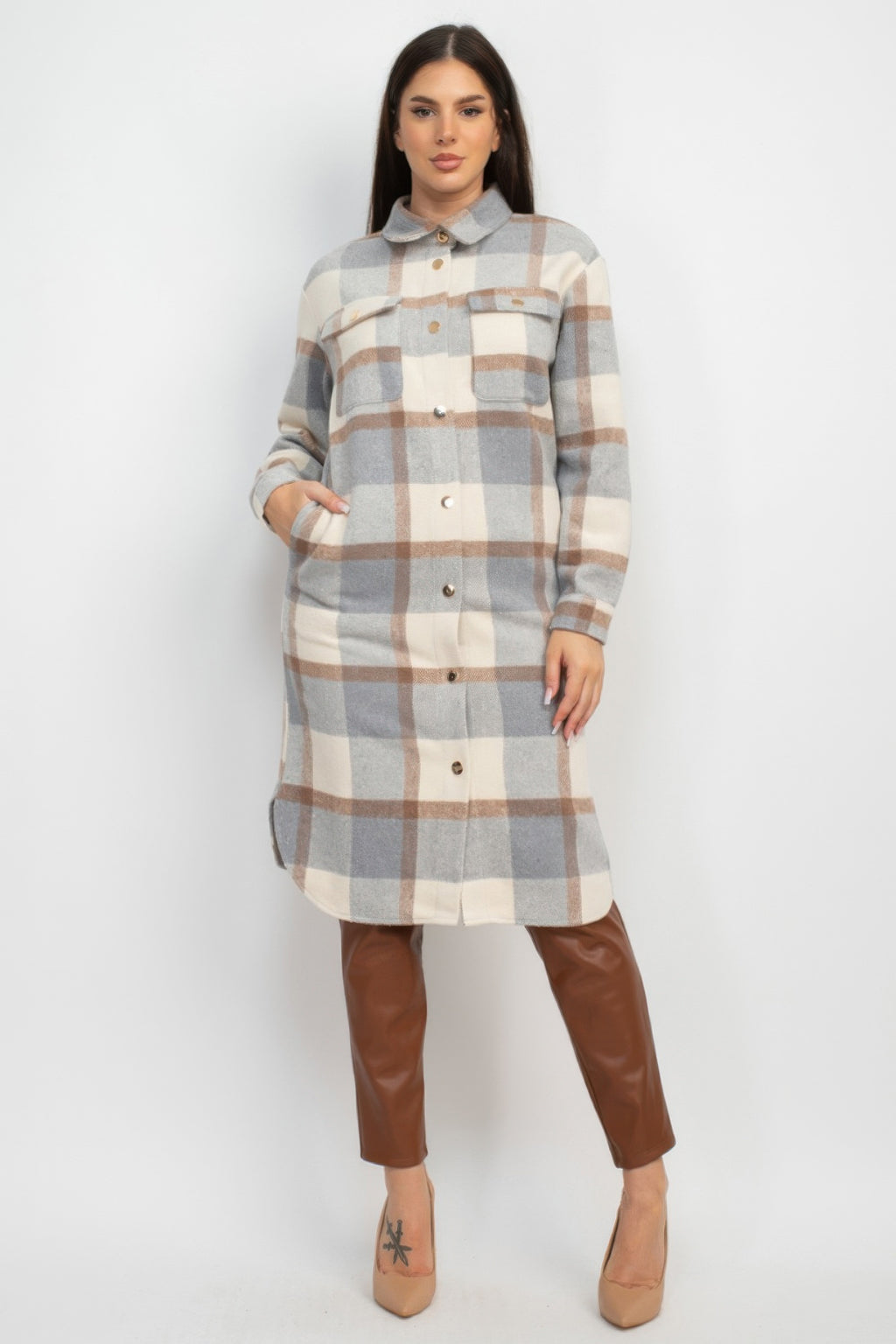 Plaid buttoned shacket coat in cream/grey/tan with long sleeves, front pockets, and buttons