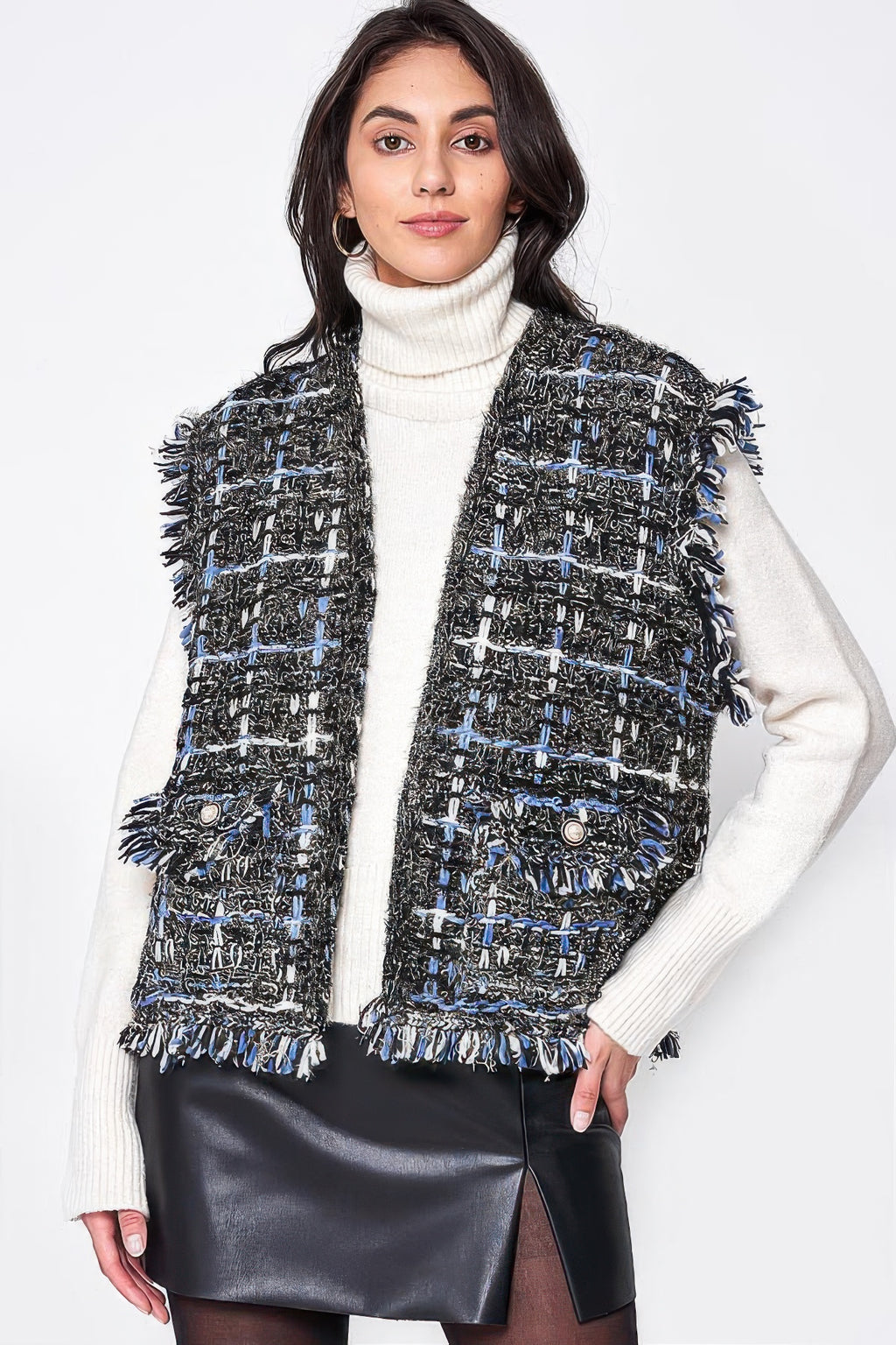 Plaid tweed vest in dark with blue lines, fringe hem, and two front pockets