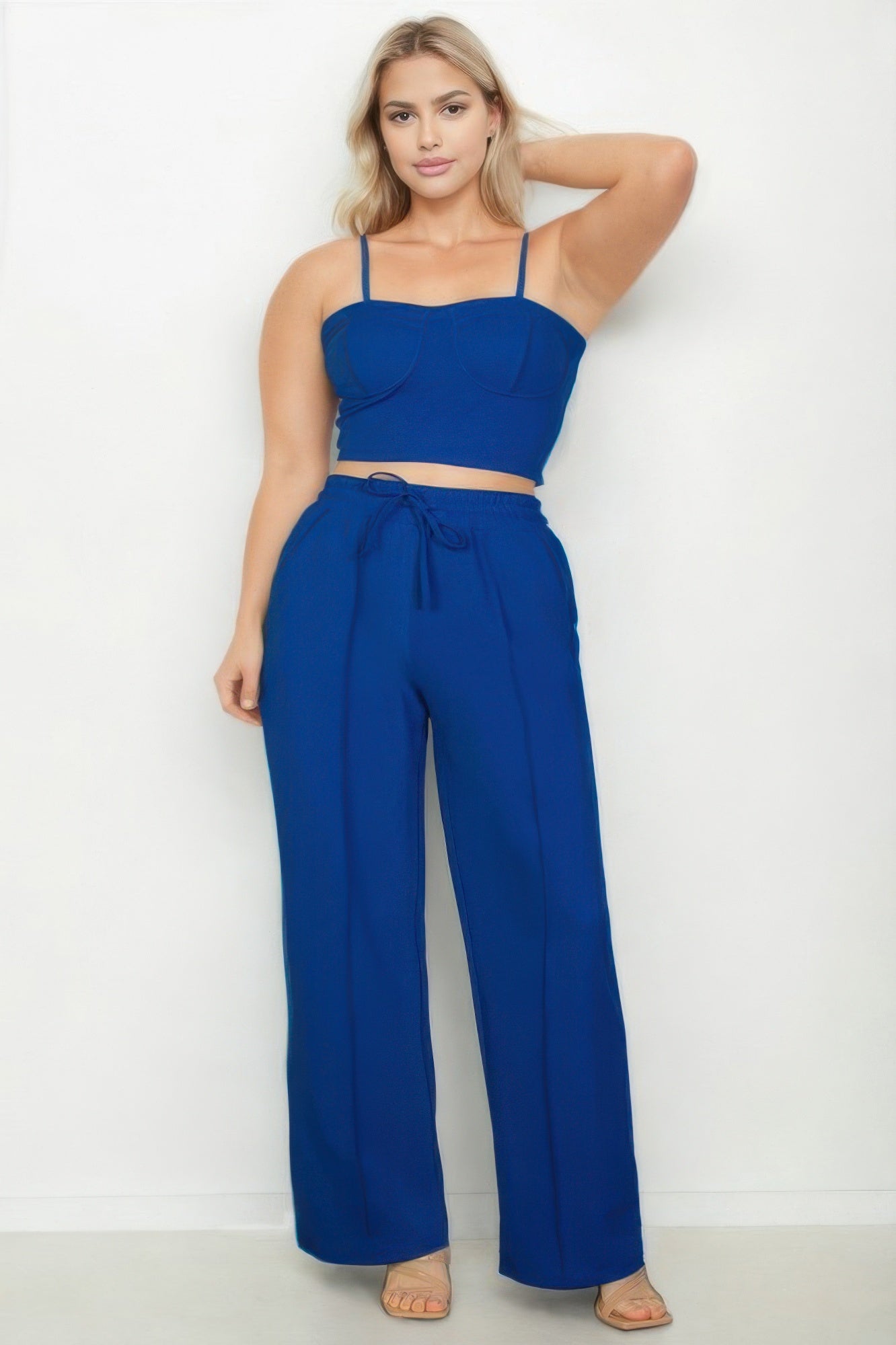 Royal blue bustier crop cami top with spaghetti straps and wide straight pants, plus-size