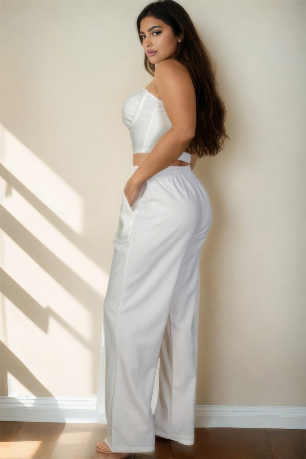 White side view bustier crop cami top with straight wide-leg pants, plus-size
