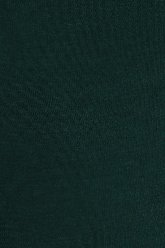 Close-up of dark hunter green knit fabric for plus size cowl neck basic top