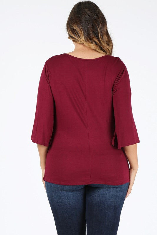 Burgundy plus size cowl neck top, back view with center seam and elbow-length sleeves