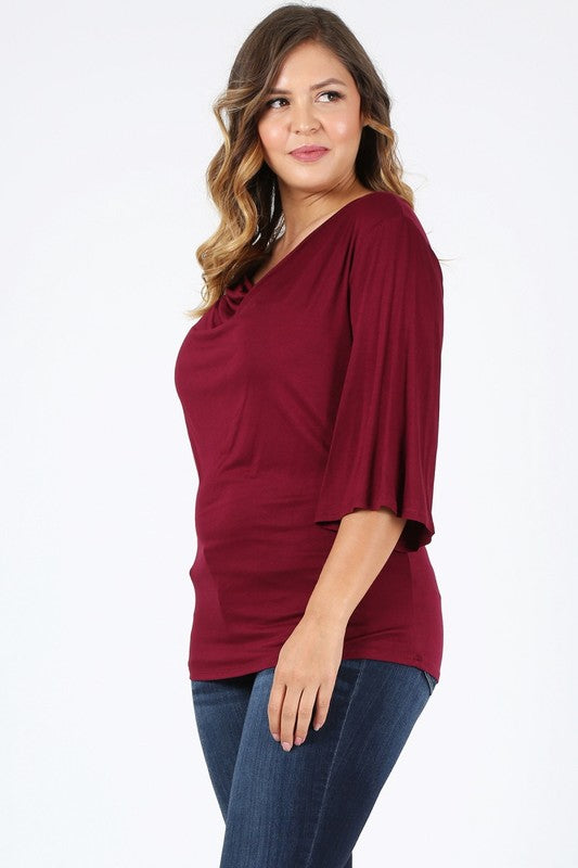 Burgundy cowl neck top, plus size, side view with elbow-length sleeves and relaxed fit