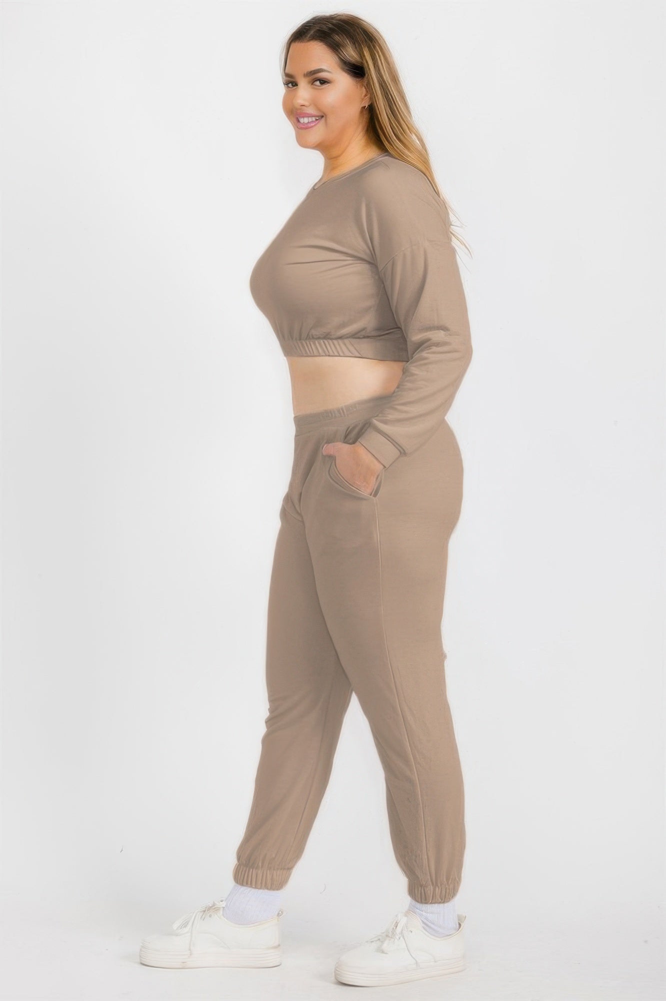 Taupe pullover and joggers set, side view; elastic waist and tapered jogger legs