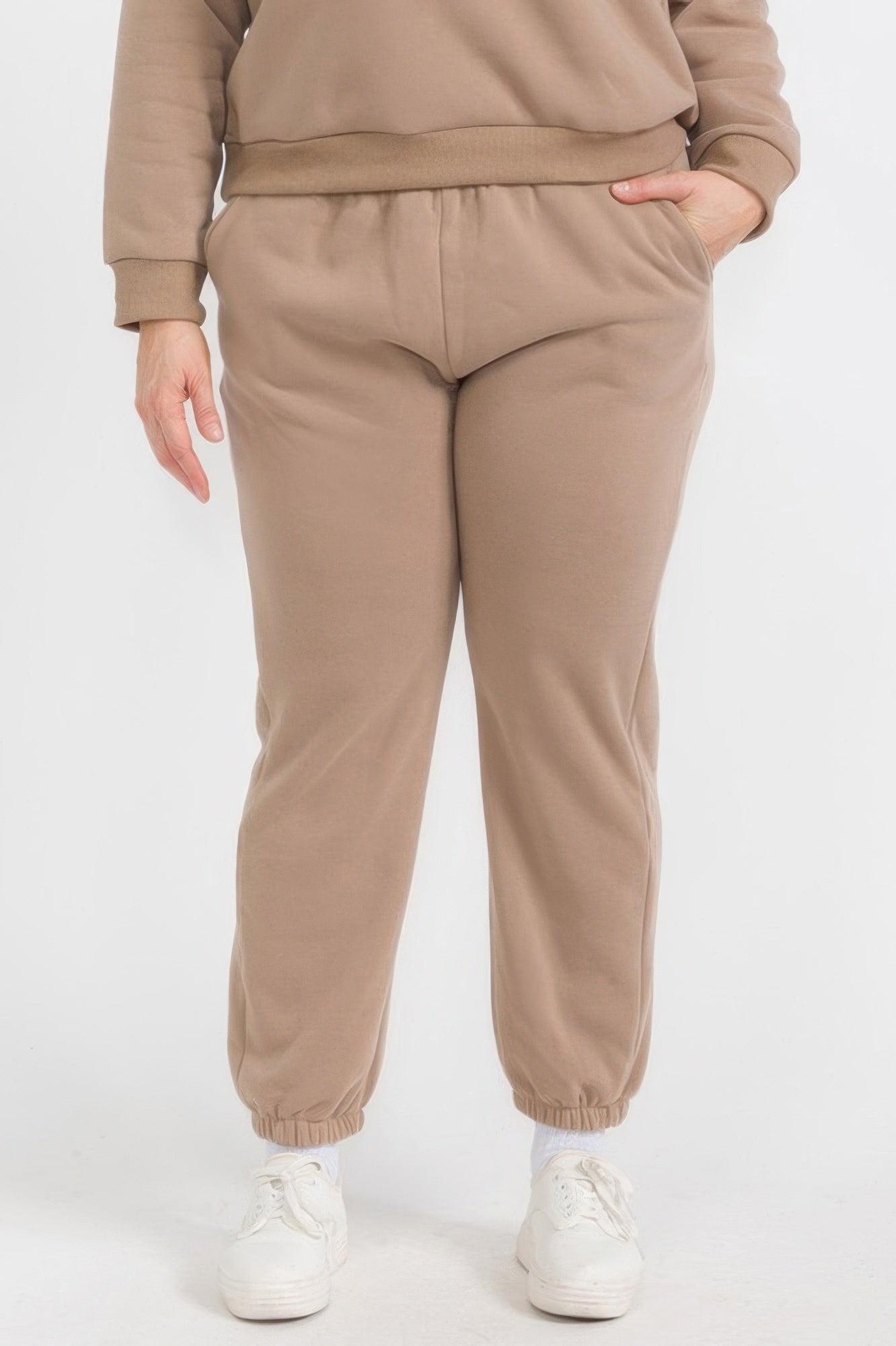 Plus size fleece joggers in taupe with elastic waistband and cuffed ankle hems