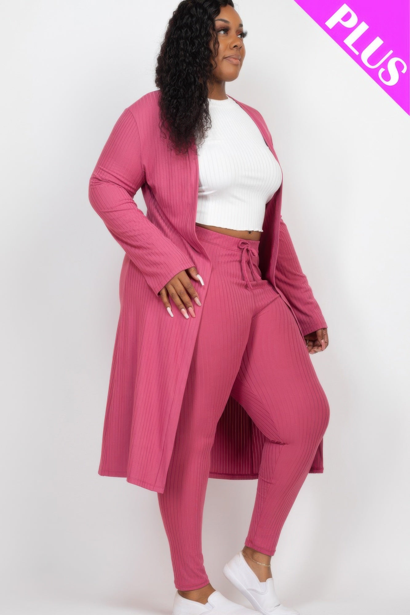 Rose-mauve cardigan draped over ribbed leggings, tie-waist details