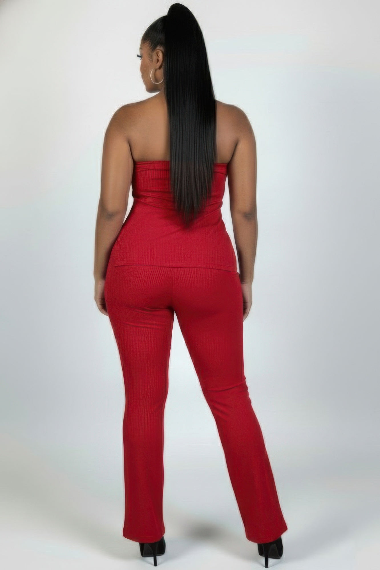 Red ribbed tube top (back view) and high-waist flare pants