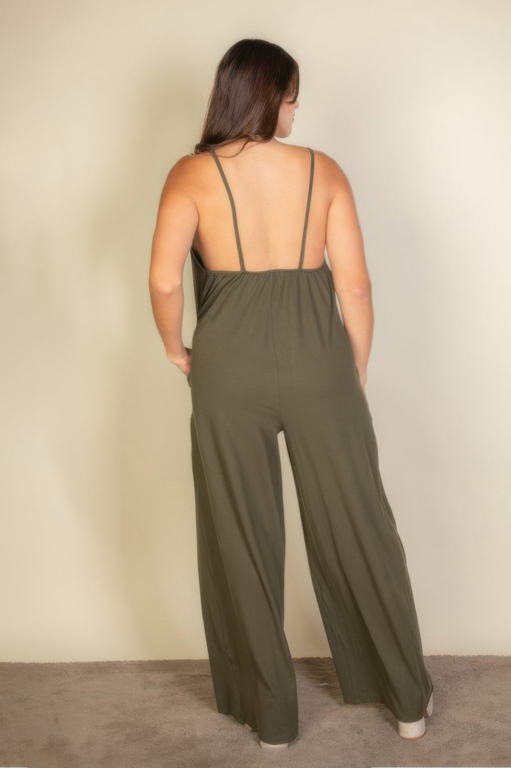 Back view: Plus olive wide-leg jumpsuit with spaghetti straps, open back