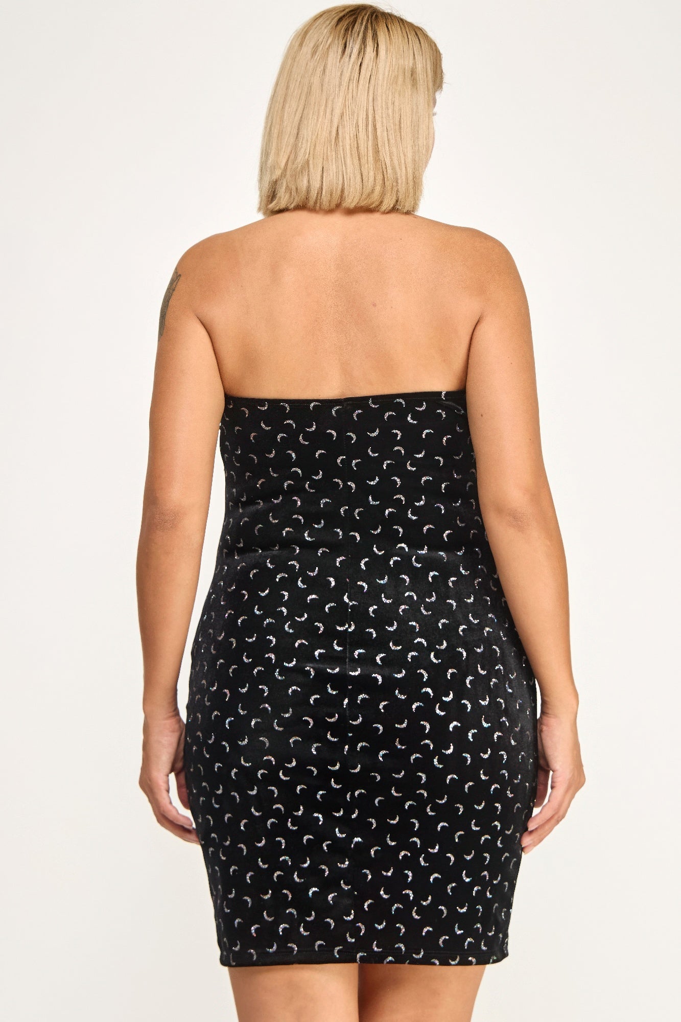 Back view strapless velvet dress, black crescent pattern, straight back, slit at front