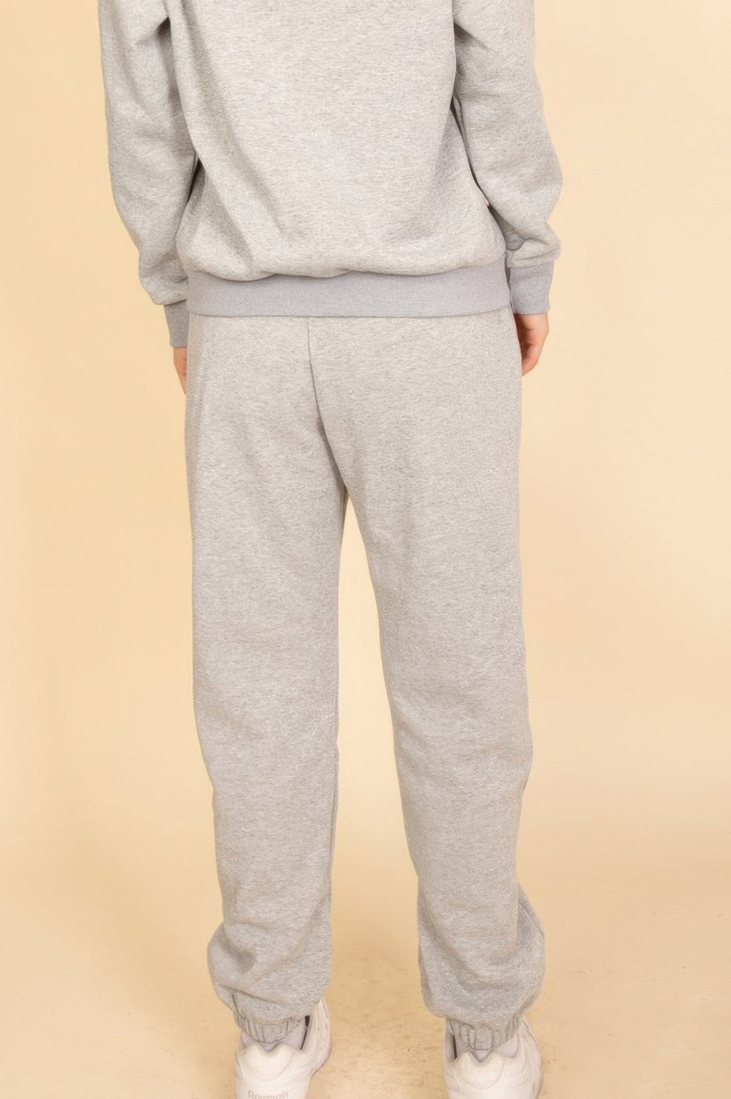 Heather grey poly fleece joggers front view, relaxed tapered fit and elastic cuffs