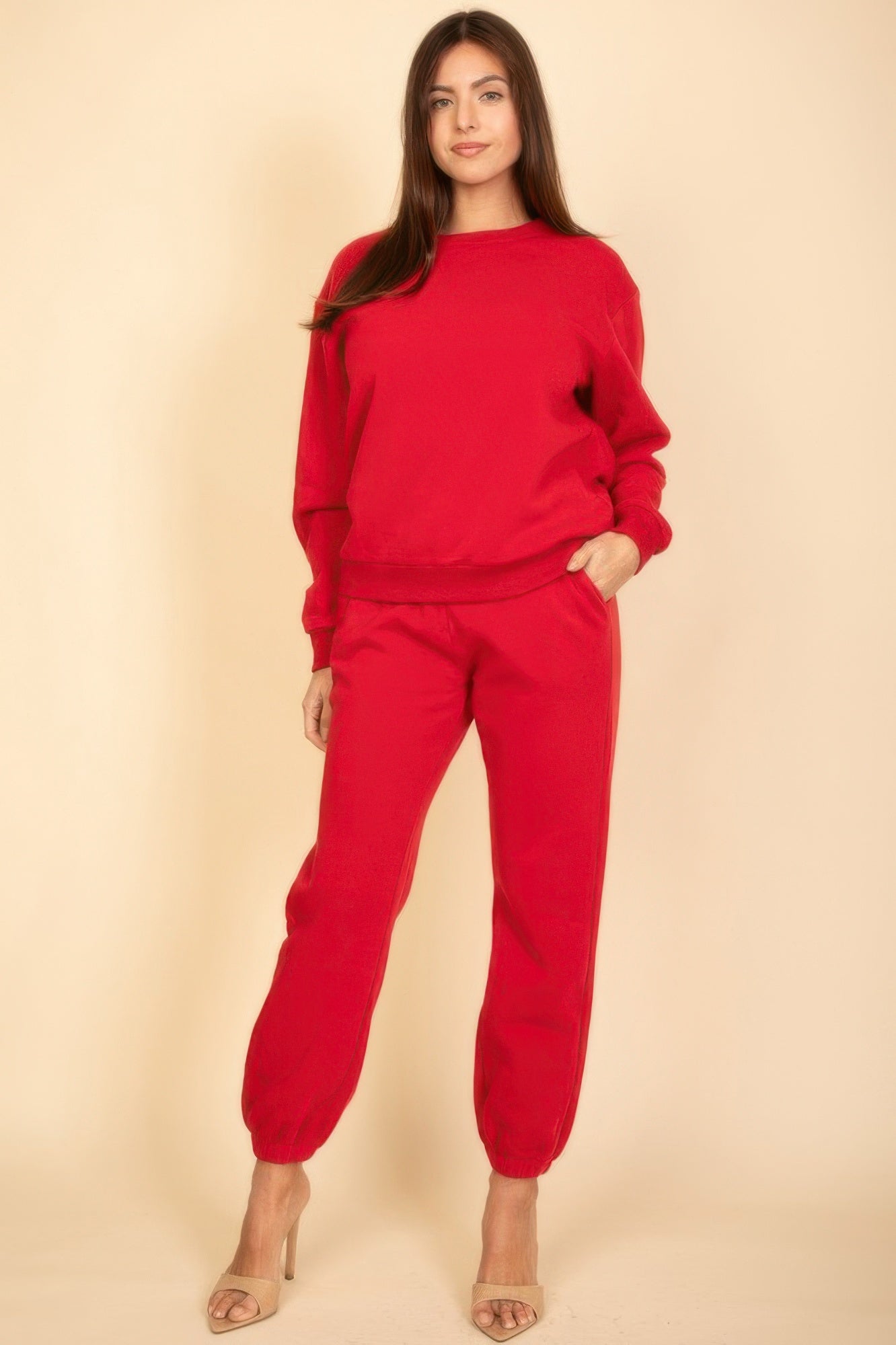 Poly fleece joggers, red with elastic waistband and cuffed ankle hems