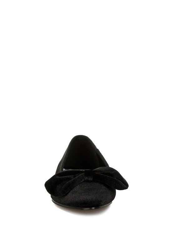 Black velvet ballerina flats, front bow in side view