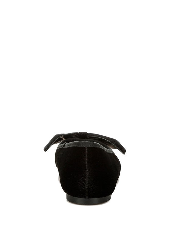 Black velvet ballerina flats, heel view with bow ties
